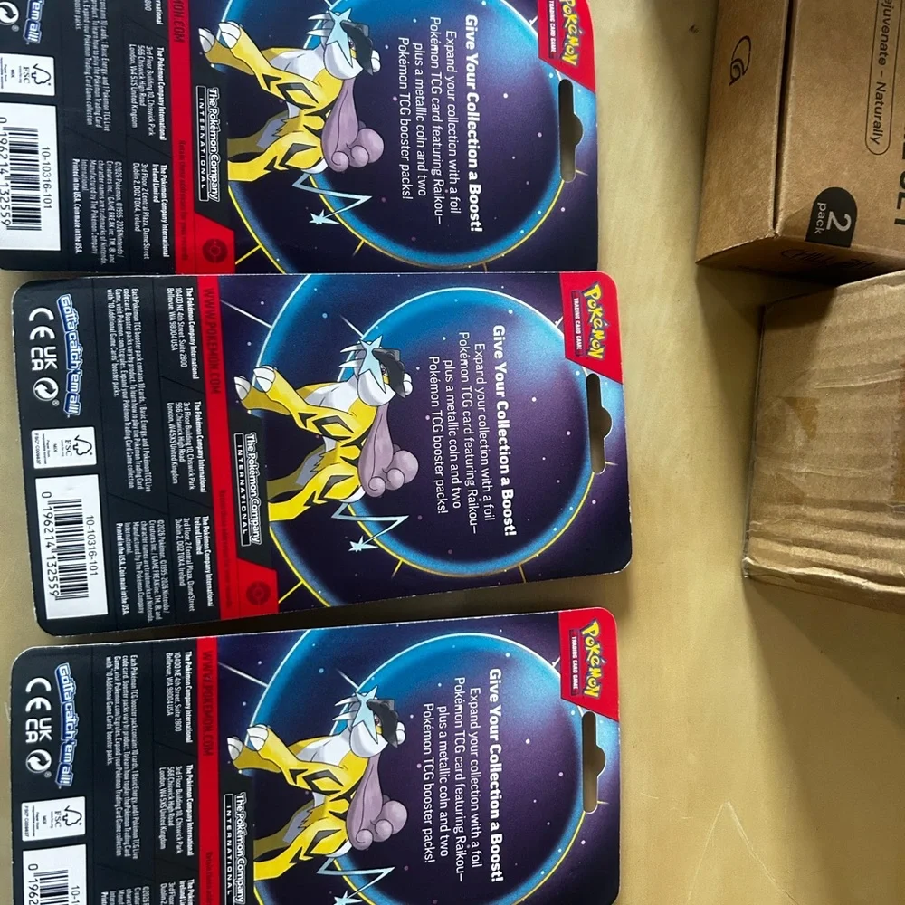Lot of 10 Pokémon TCG booster double pack with two packs inside featuring Raikou